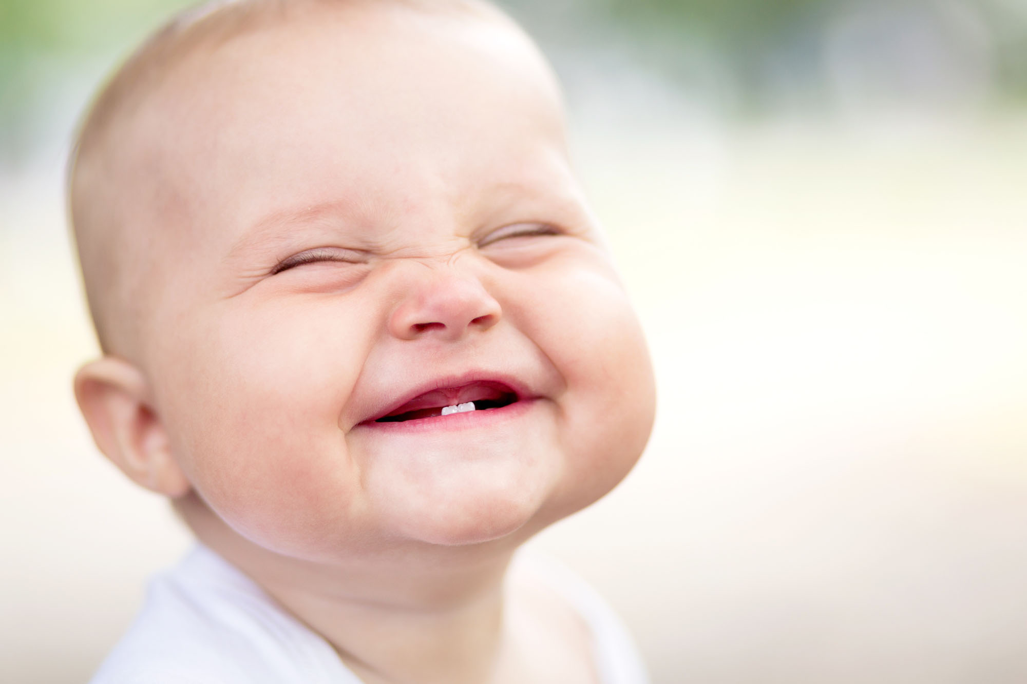 Smiling baby with bottom teeth | Children's Dentistry of Elko